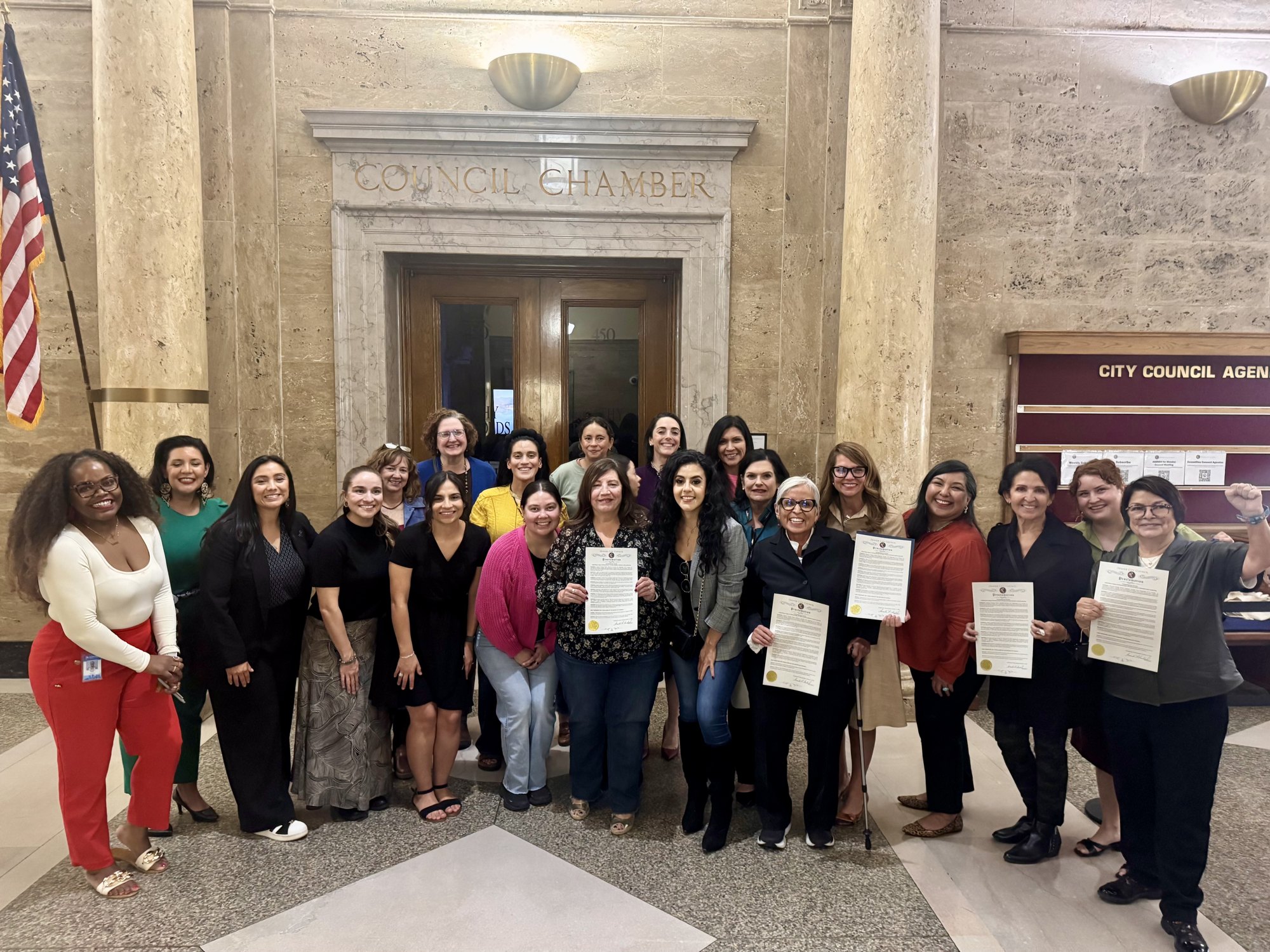 Members receiving a proclamation at the Denver City Council chamber